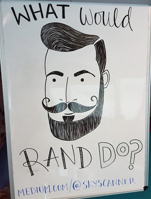 rand-mustache-skyscanner